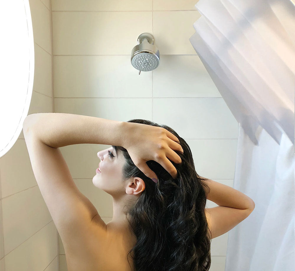 https://moreshowerspace.com/cdn/shop/files/SPACE_Woman_in_Shower-cropped.jpg?v=1688201995&width=2000